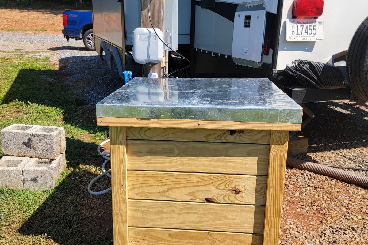 The wooden utility cabinet housing the park network equipment